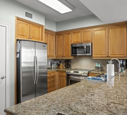 Full chef's kitchen with coffee maker, blender, toaster, plenty of pots &amp; pans