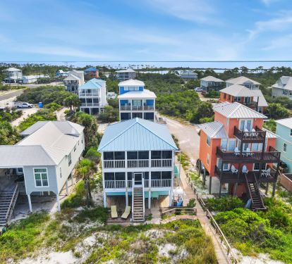 Aerial view of home looking back from the beach