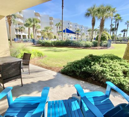 Great view and grass area from C204 patio with direct access to upper pools
