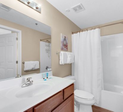 BATHROOM WITH TUB AND SHOWER