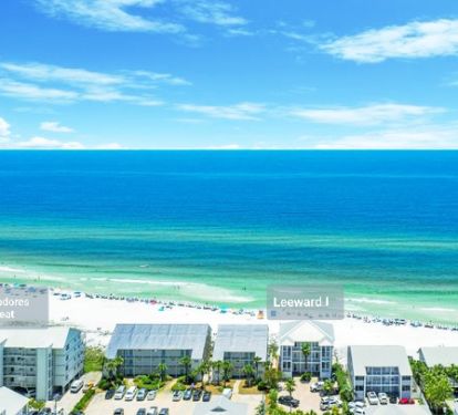 Commodores Beach in front of building