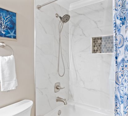 Updated bath with porcelain steel tub and new tile
