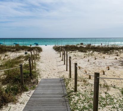 Walkway to the beach right outside of our beach side queen bedroom