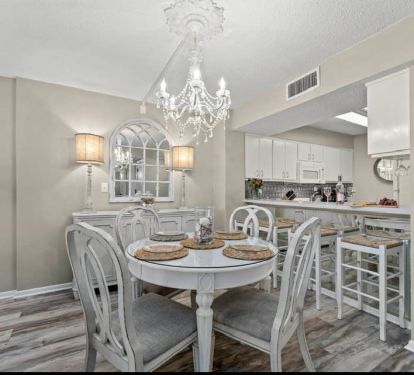 Dining area- bar has 4 bar stools.