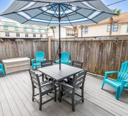 Enjoy a meal al fresco on the private back patio. After dark, turn on the lights