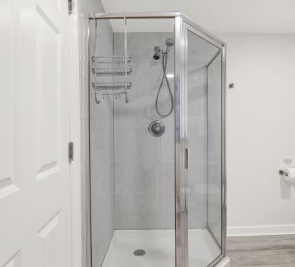 As part of the primary suite, walk in shower and jetted tub.