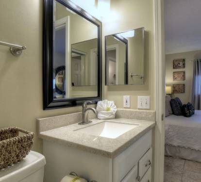 Entrance to private half bath from master bedroom.