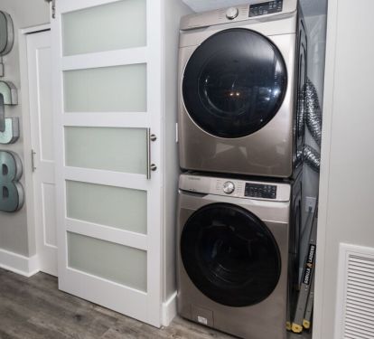 Full-size, large-capacity washer and dryer directly in the unit.
