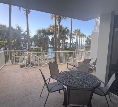 The Balcony overlooking our private patio with BBQ pit and the lazy river