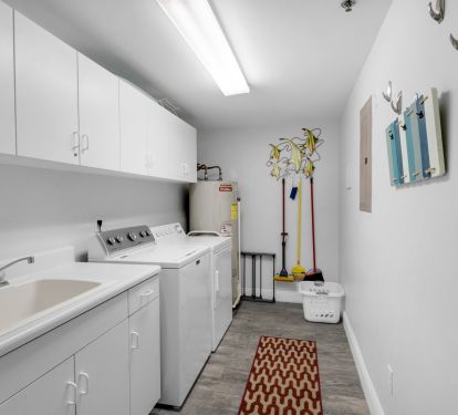 Full size laundry room with sink