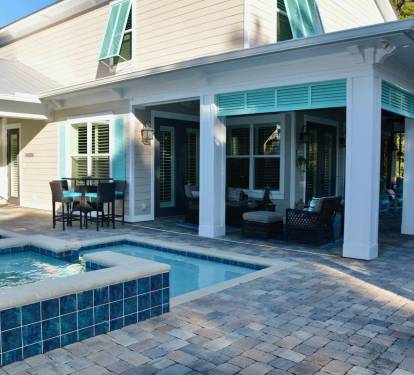 Pool and seating for twenty, hot tub/spa connected to pool.