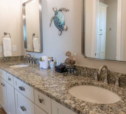 Second Floor Jack and Jill Bathroom with double sinks and shower/tub.