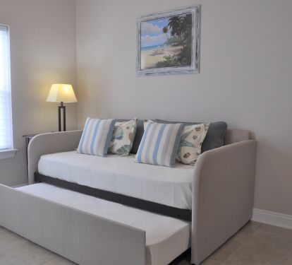 Master suite sitting room with double twin sofa daybed