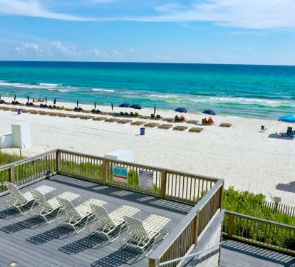 Beautiful Quiet Beach with your Free Chairs and Umbrella