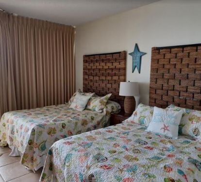 Guest bedroom with 2 double beds, large closet, personal temperature controls.
