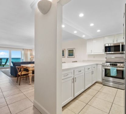 Kitchen is open to the dining area.