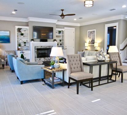 View of the large Family Room open to the Dining room &amp; Kitchen