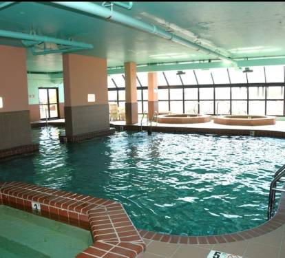 Rainy day? No problem! This indoor pool with three hot tubs has you covered!