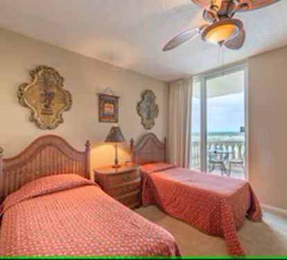 View of Twin Bedroom and Small Balcony
