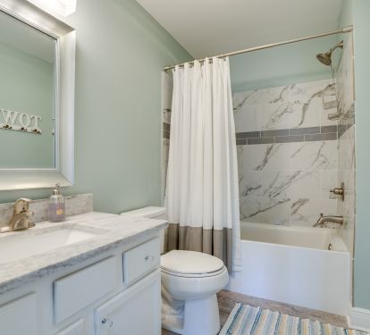 Hall Bath with tub/shower combo.