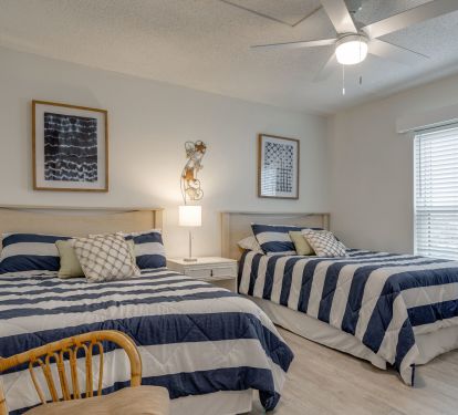 SECOND BEDROOM W/ 2 FULL BEDS 