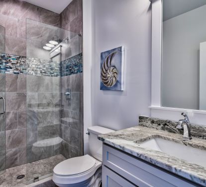 7.5 bathrooms with granite and stunning walk-in tiled showers