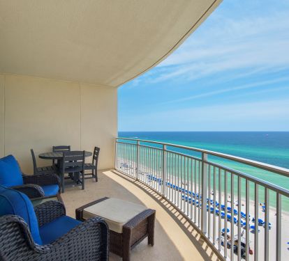 Large balcony allows for outdoor dining and seating with a fantastic view.