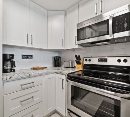 Full Kitchen with appliances and cooking essentials