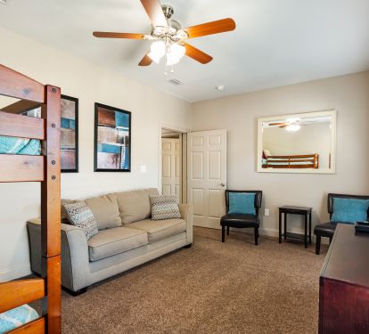 2nd living room offers plush sofa and two accent chairs