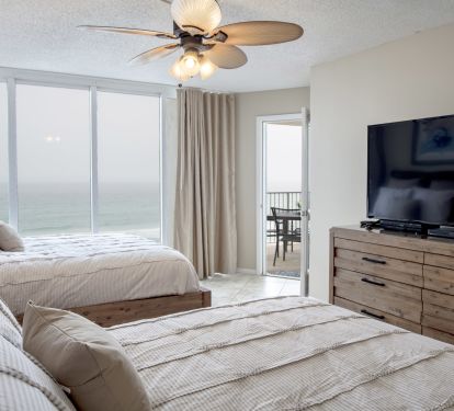 Guest Bedroom With 2 Queen Beds And 55" Flat Screen TV