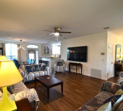 Plenty of room for everyone to relax and enjoy the 85 inch smart TV