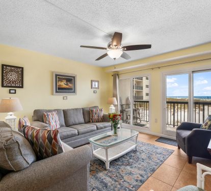 Living room with Queen size sleeper sofa.