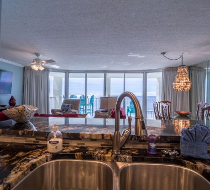Check out the view with open concept living; 3 smart TVs, bluetooth speaker
