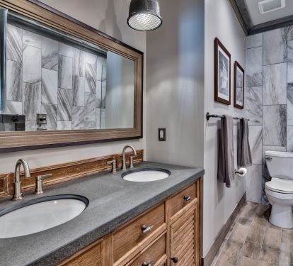 1st en-suite Master bath with twin vanity sinks and custom lighting