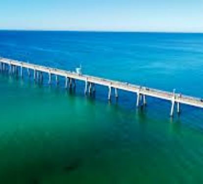 The beautiful Okaloosa Island Pier is visible from our patio &amp; just a 5 min walk