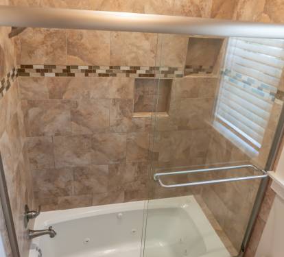 Second Floor Jack and Jill Bathroom with double sinks and shower and jacuzzi/tub