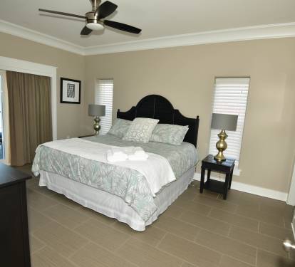 1 OF 2 - 4TH FLOOR MIRRORED KING MASTERS W/EN-SUITE OPENS TO GULF FRONT DECK.