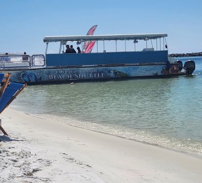 Included Beach Shuttle and one umbrella, and four chairs for free!!