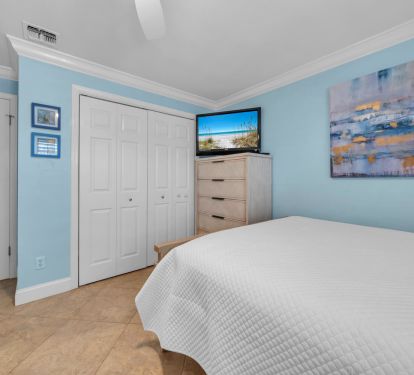 Third bedroom with bunk bed and queen