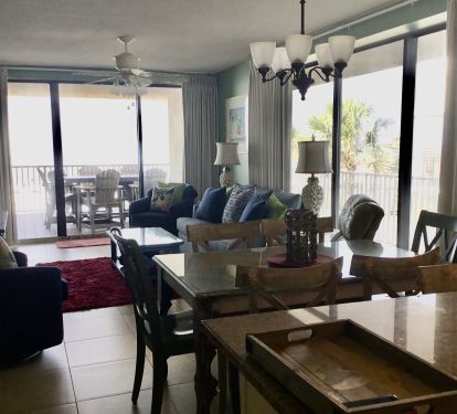 Relax in large living area surrounded by beautiful views at every turn