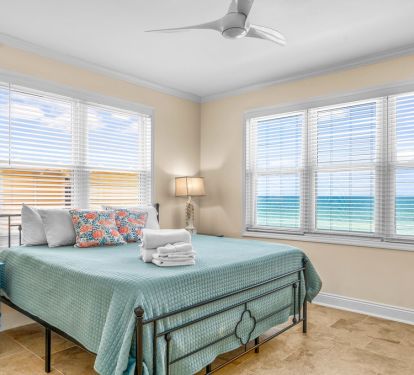 Upstairs King primary with Gulf views and private bath