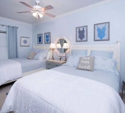 Bedroom with two queen beds.  