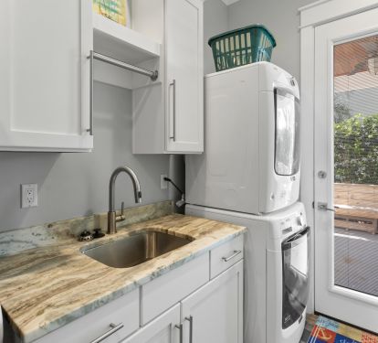 First Floor Laundry Center and Refrigerator 