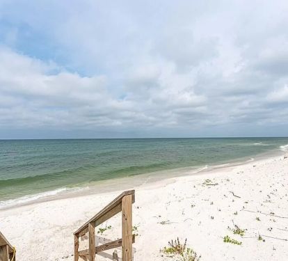Boardwalk right next to home to Access Beach