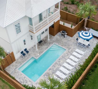 Fenced, private backyard. Pool has bench and easy entry steps
