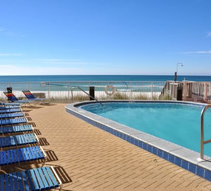 A heated indoor/outdoor pool awaits while one can gaze out to the sea.