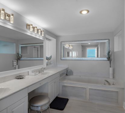 Luxury bathroom with makeup area