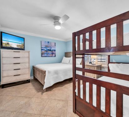 Third bedroom with bunk and queen bed