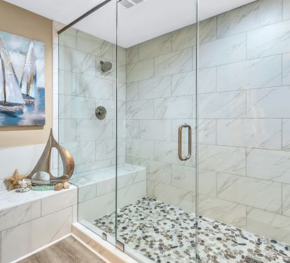 Large walk in double headed shower in master bathroom