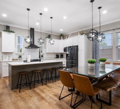 Kitchen bar and dining table allow for up to  15 guests to dine together at once
